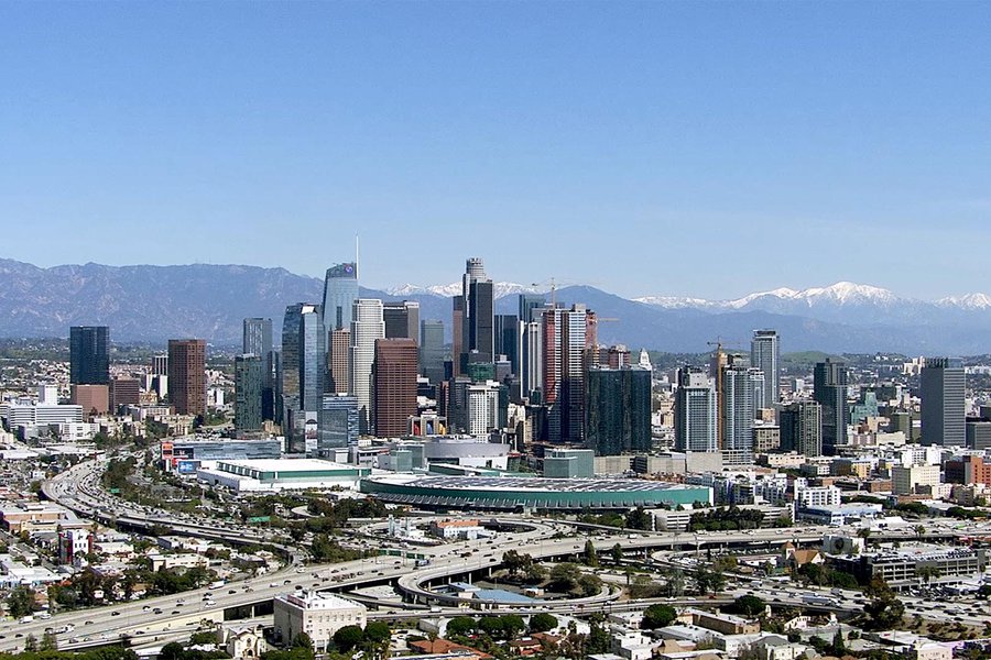 HD Aerial Helicopter Still Image of Downtown Los Angeles, California with Snow in the Mountains