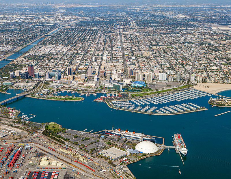 Aerial cityscape of Downtown Long Beach with the Queen Mary in the foreground