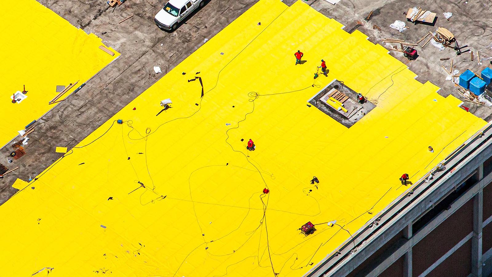 Construction photo of a roof waterproofing membrane installation in Los Angeles, California