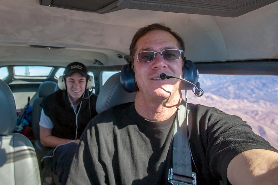 Portrait of Aerial Photographer Mark Holtzman and son Steven Holtzman Flying in their Airplane