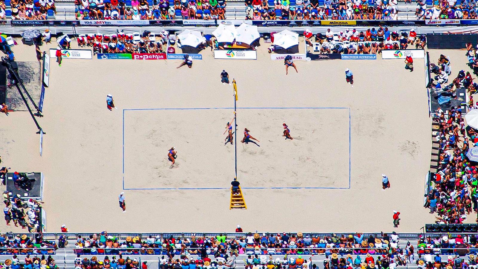 Sports photo of two players at the net during the 2014 ASICS World Series of Volleyball