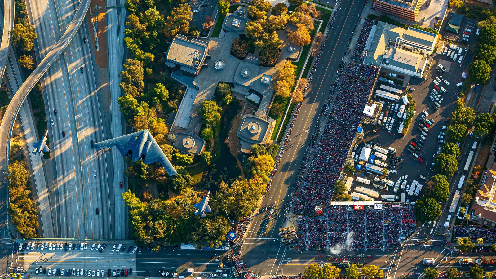 Press image of the 2018 Rose Parade Flyover with a B-2 Spirit and two F-35 Lightning IIs