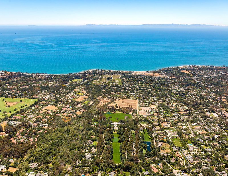 Residential celebrity real estate photo of Oprah Winfrey's The Promised Land home in Montecito, California with Anacapa and Santa Cruz Islands in the background