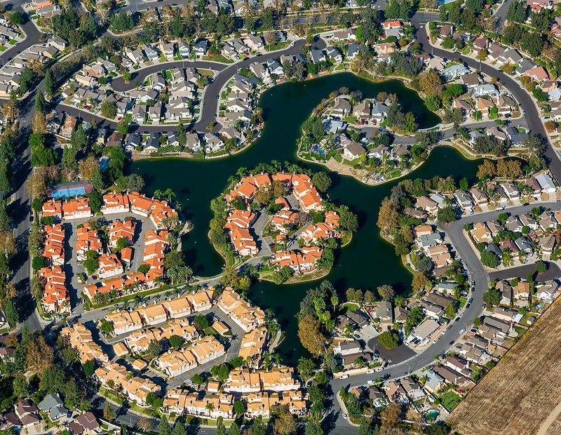 Residential community real estate image of the Portofino at Creekside housing community in Ontario, California