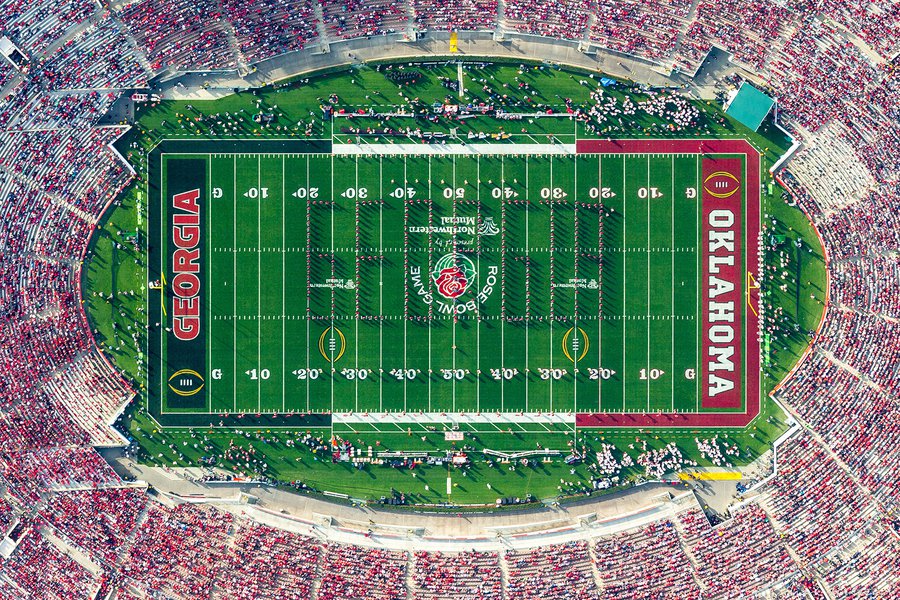 The University of Georgia Bulldogs marching band is proudly spelling out 'GEORGIA' in the iconic Rose Bowl Stadium, as thousands of dedicated and passionate fans cheer them on during the 2018 Rose Bowl Game in Pasadena, California.