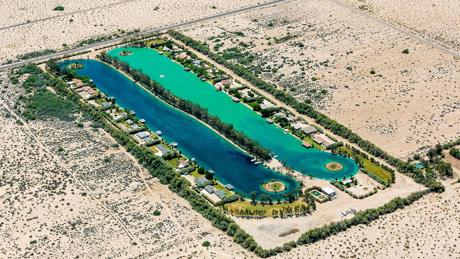 Residential real estate photo of the Imperial Lakes community and its water ski lakes in El Centro, California