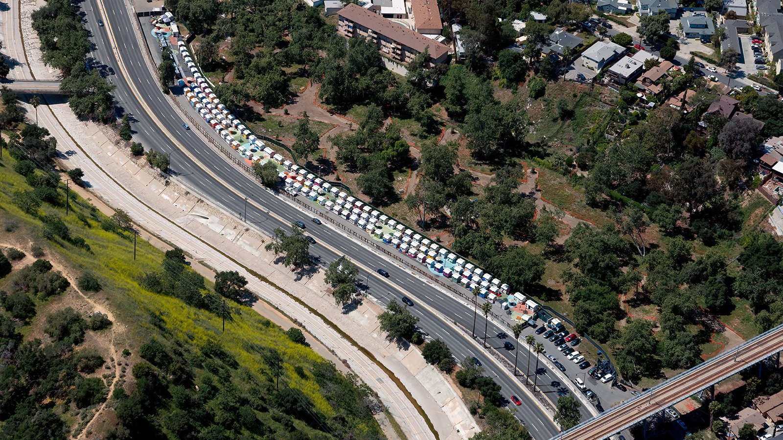 Aerial photograph of the Arroyo Seco Tiny Home Village off the 110 Freeway, in Highland Park, California