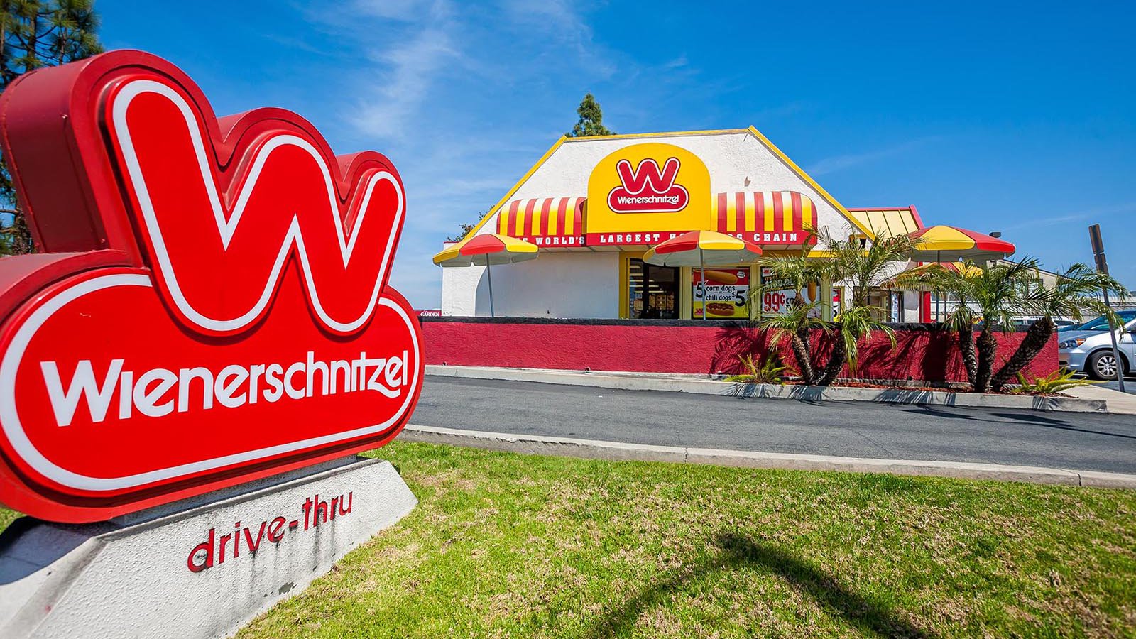 Exterior architectural image of a Wienerschnitzel restaurant in Costa Mesa, California