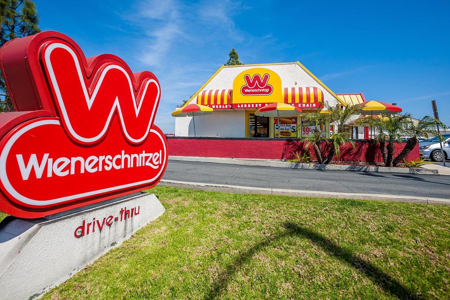 Exterior architectural image of a Wienerschnitzel restaurant in Costa Mesa, California