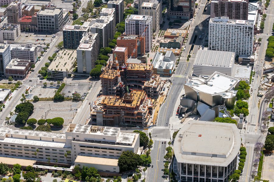Aerial construction photo showing the construction progress of The Grand, with the Dorothy Chandler Pavilion, Stanley Mosk Courthouse, Walt Disney Concert Hall and The Broad also visible.