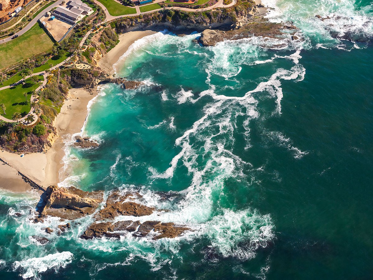 Blog image of the cliffs near Laguna Beach, California, shortly after a tsunami water was declared following a large earthquake in Chile.