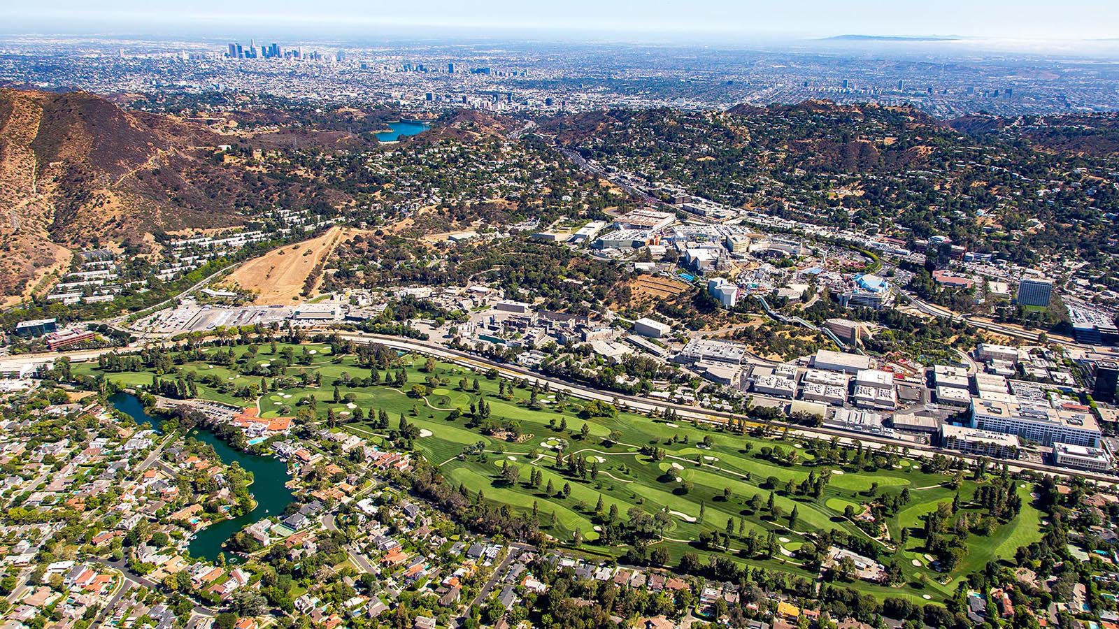 Sports photo of Lakeside Golf Club in Toluca Lake with Downtown Los Angeles and Santa Catalina Island in the background