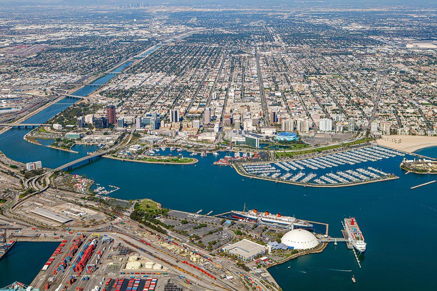 Aerial cityscape of Downtown Long Beach with the Queen Mary in the foreground