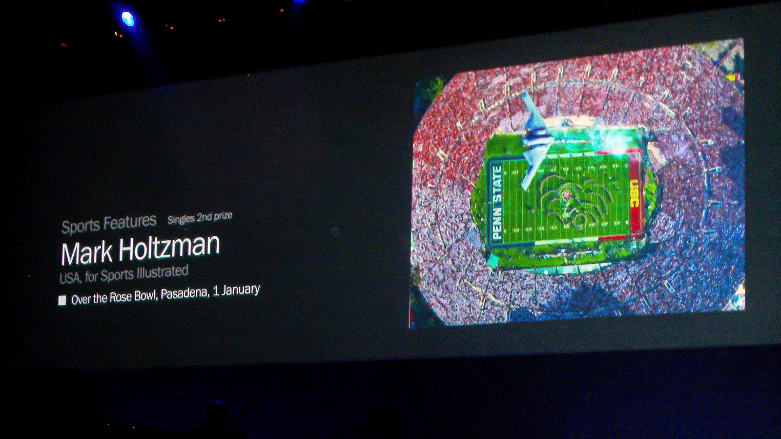 Press photo Mark Holtzman's award-winning photograph of the B-2 Bomber over the Rose Bowl at the 2010 Awards Ceremony in Amsterdam, Netherlands