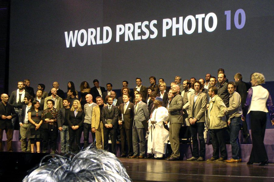 Press photo of Mark Holtzman and other World Press Photo Award Winners at the 2010 Awards Ceremony in Amsterdam