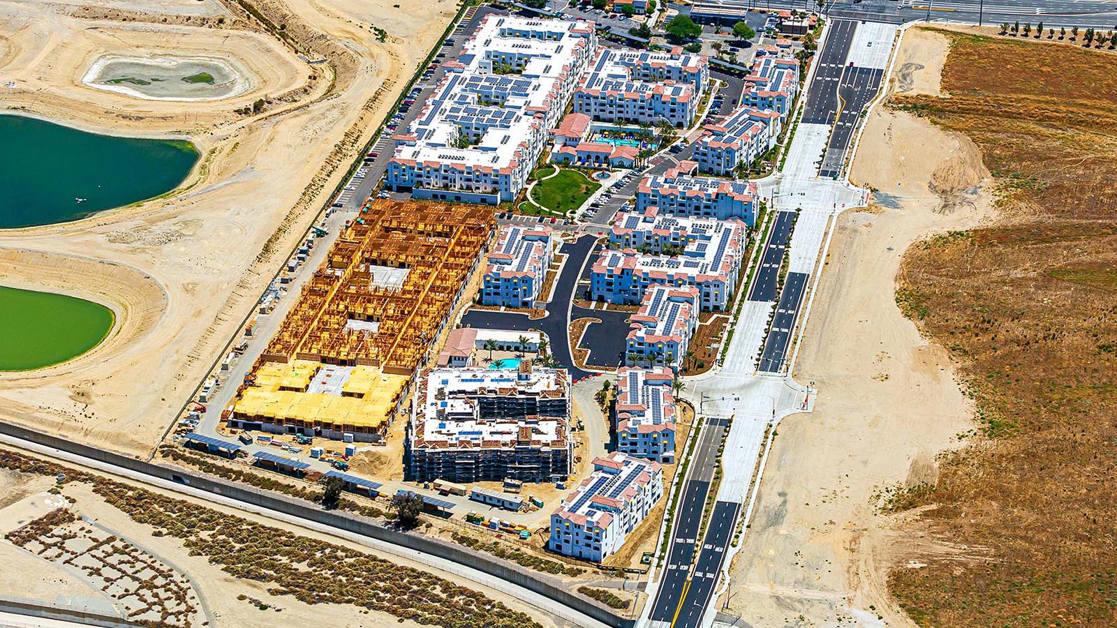 Construction photo of luxury apartments being constructed in Ontario, California