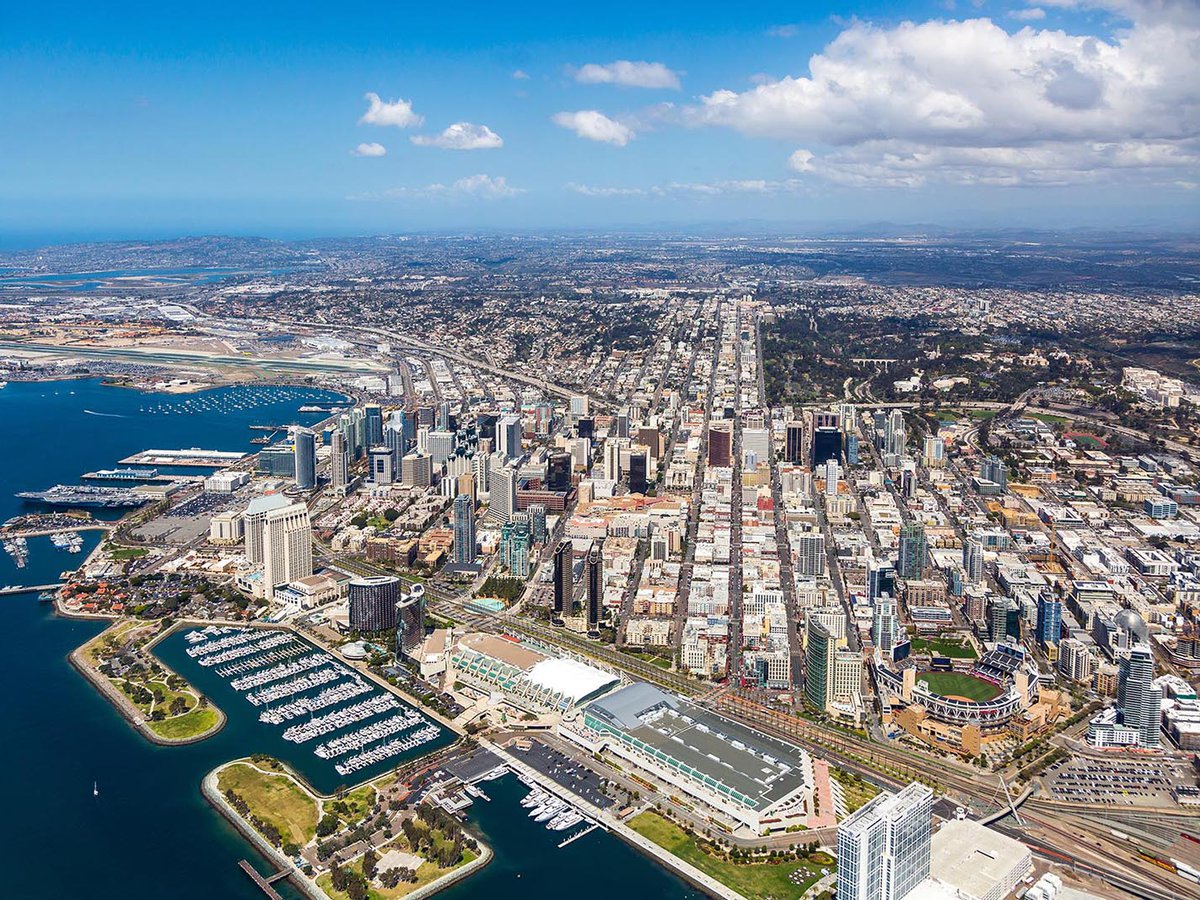 Aerial cityscape of the Downtown San Diego Skyline with the San Diego Convention Center and Petco Park in the foreground