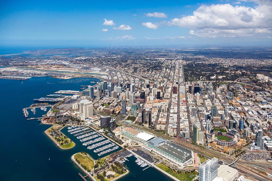 Aerial cityscape of the Downtown San Diego Skyline with the San Diego Convention Center and Petco Park in the foreground