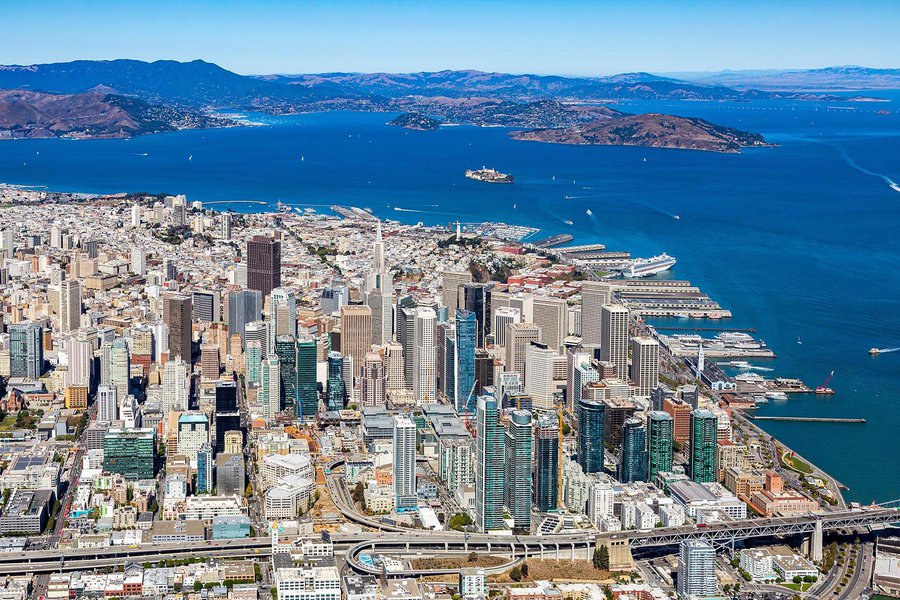 Aerial cityscape of Downtown San Francisco with Alcatraz Island in the background