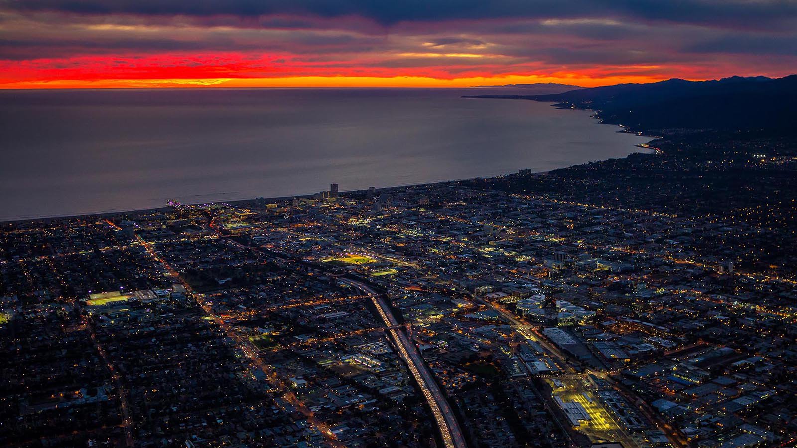 Aerial cityscape of the Santa Monica Bay at Sunset with Santa Cruz Island in the distance