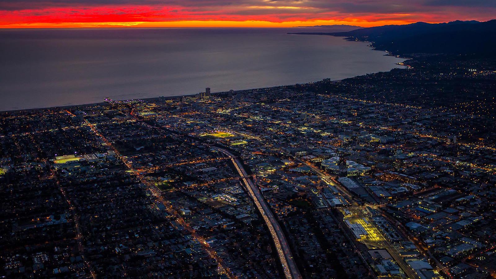 Aerial cityscape of the Santa Monica Bay at Sunset with Santa Cruz Island in the distance