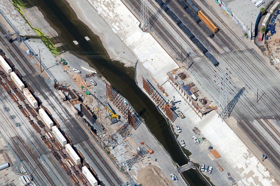 Aerial photograph of the Sixth Street Bridge construction as the initial supports are installed on opposite sides of the Los Angeles River