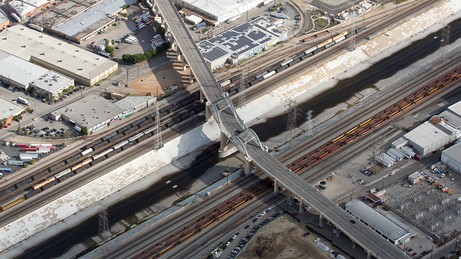 Aerial photo of the original Sixth Street Viaduct Bridge as it crosses the LA River in Downtown Los Angeles, California