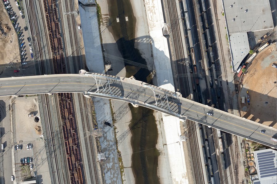 Vertical blog image of the original Sixth Street Bridge as it crosses the LA River, connecting DTLA and Boyle Heights, California