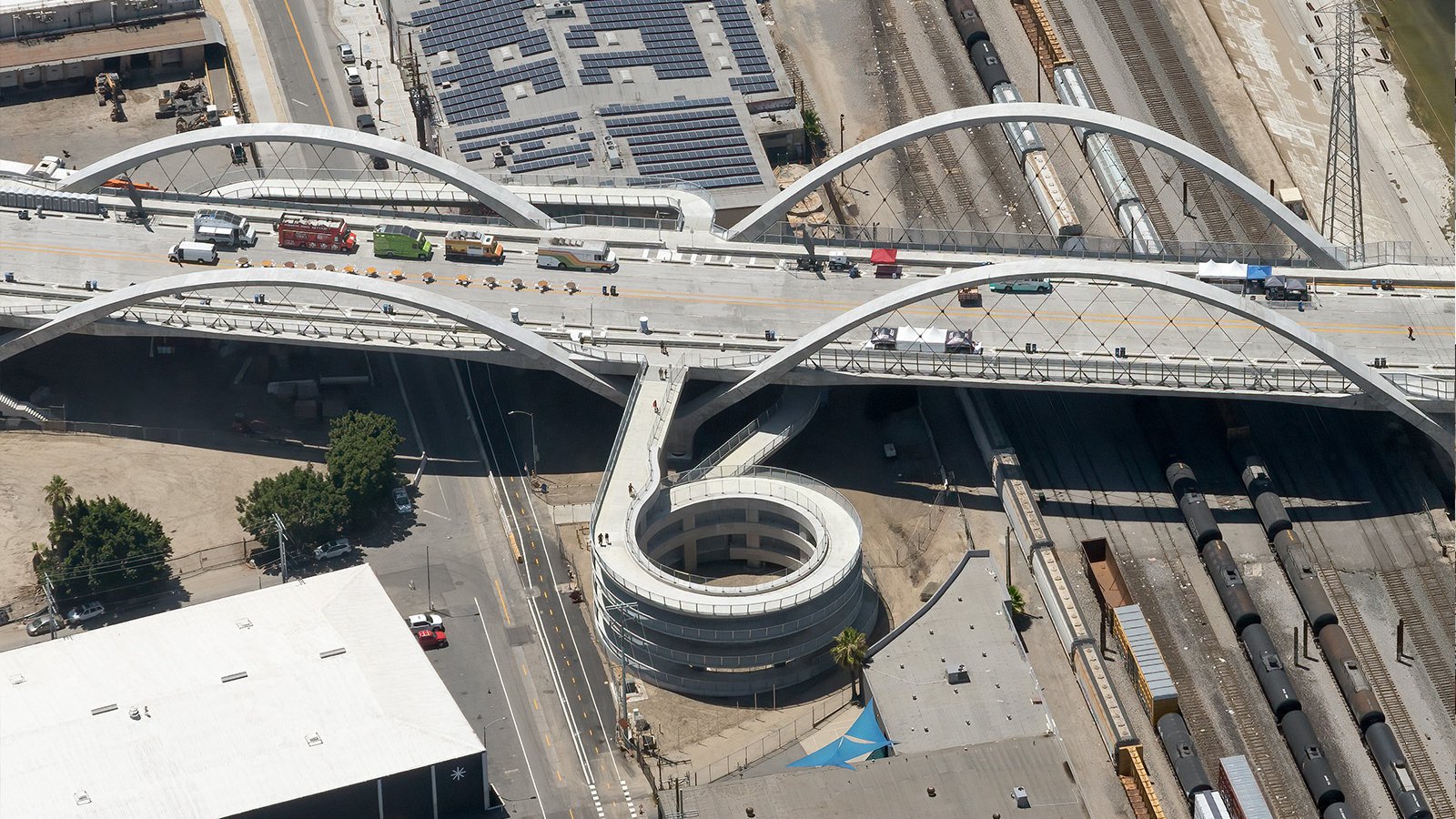 Aerial blog image of the circular ramp to access the Sixth Street Bridge during its opening weekend in Downtown Los Angeles, California