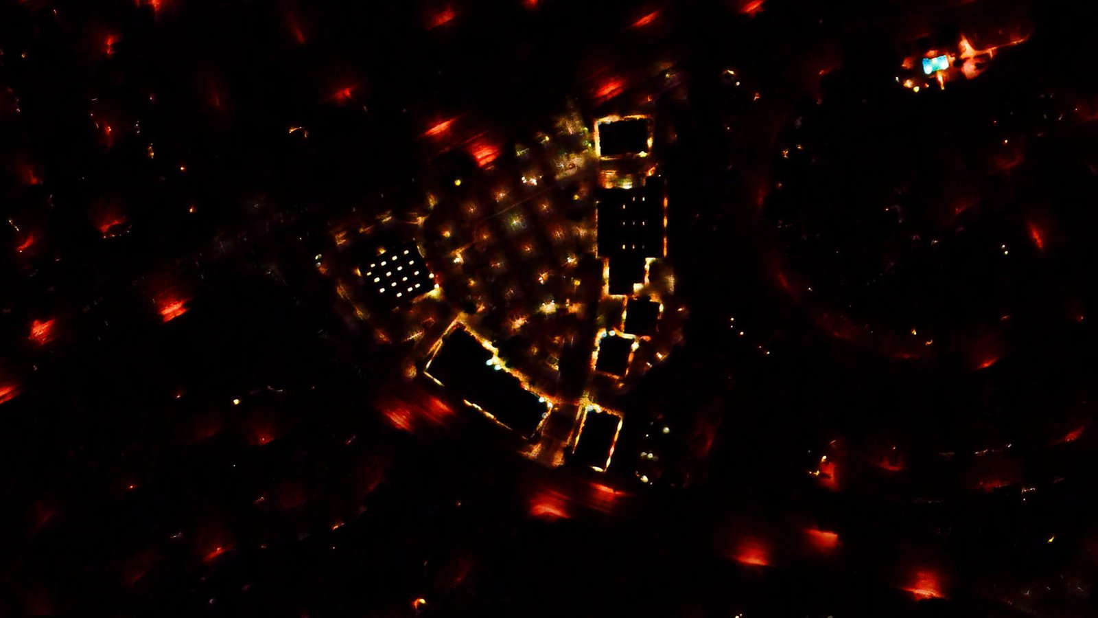 Blog close-up before image, showing a shopping center with existing halogen lighting in Temecula, California before conversion to LED lighting