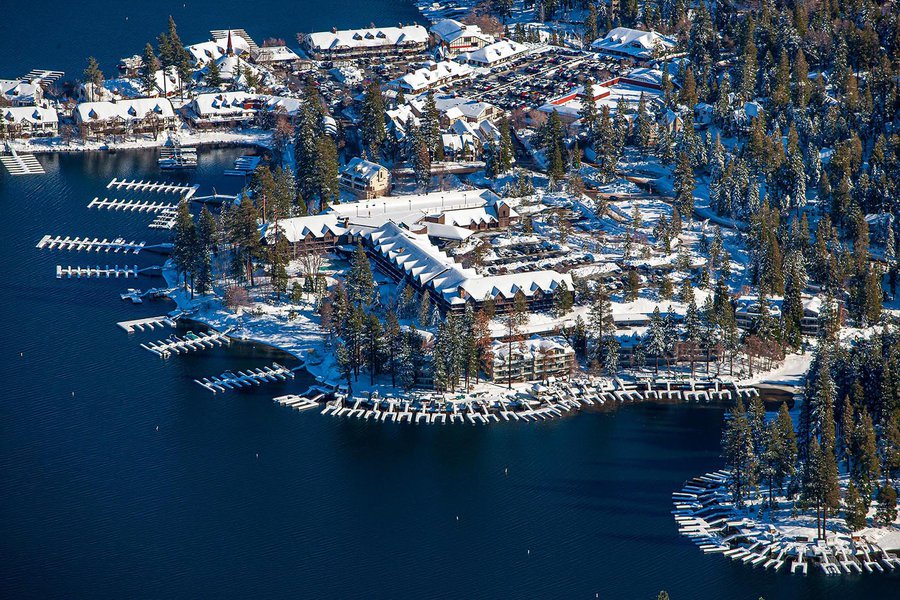 Commercial real estate image of the  Lake Arrowhead Resort & Spa covered in snow in the winter