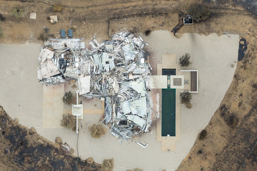 This aerial photograph shows the ruins of a home in Arroyo Sequit that was completely destroyed by the Woolsey Fire in November 2018.