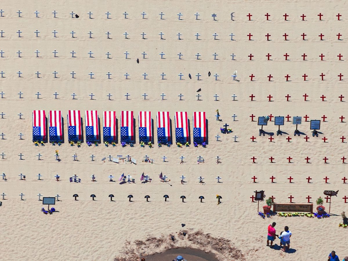 Blog photo of crosses and coffins on the beach in Santa Monica on a somber Memorial Day