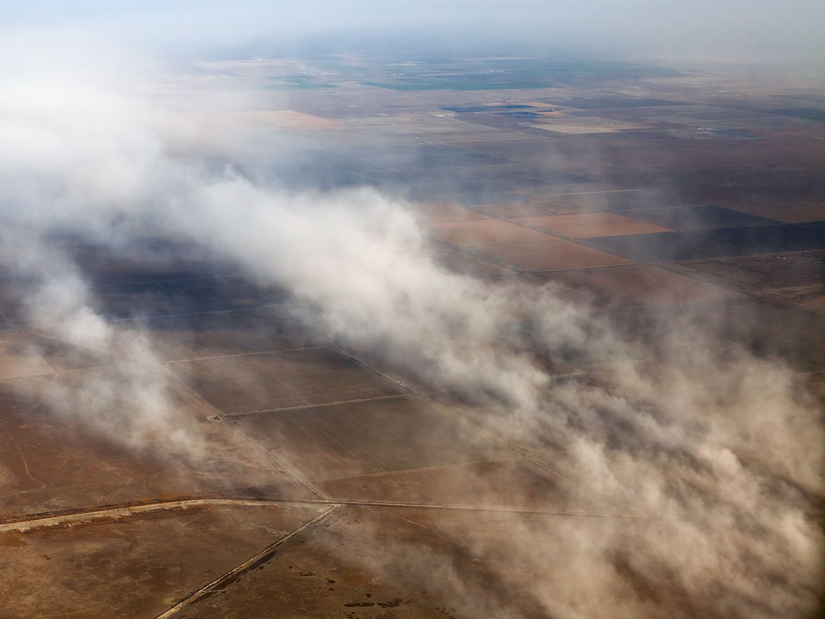 Blog aerial photograph of a unusual dust storm in the California Central Valley near Fresno, California