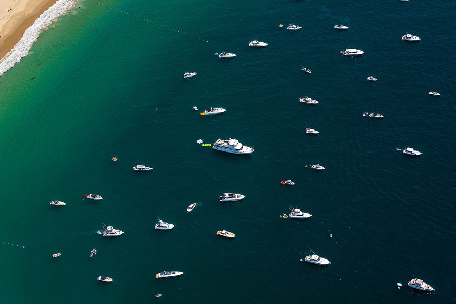 Blog image of ships, yachts and megayachts anchored in Emerald Bay in Laguna Beach, California