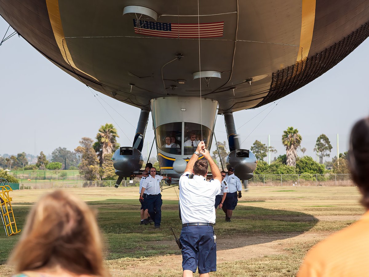 Blog image of the Goodyear Blimp crew helping to bring the airship to the ground for landing in Gardena, California