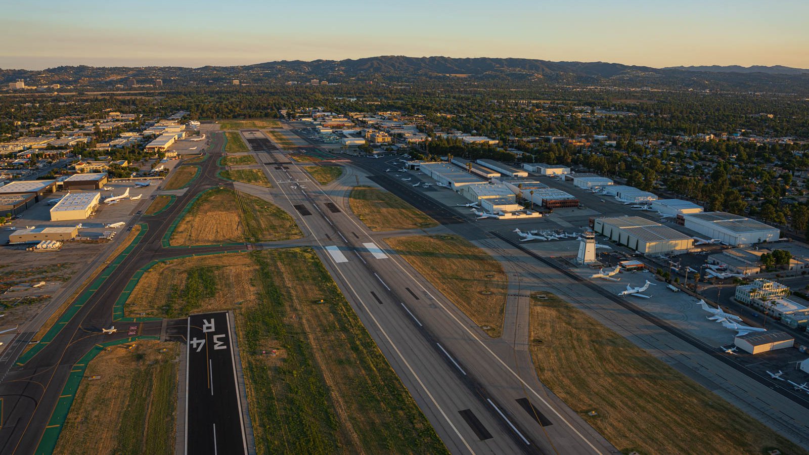 Blog photo looking down the small runway at Van Nuys Airport at Sunset